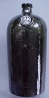 black glass with seal
